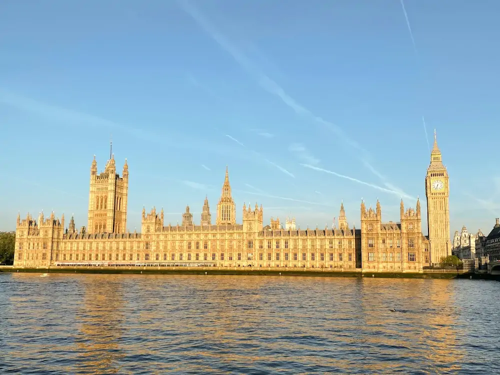 Big Ben and Westminster Palace with Thames River in London