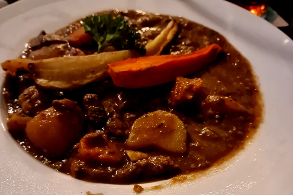 Homemade Irish stew served at O’Neill’s Pub in Dublin, perfect for a family meal with teens