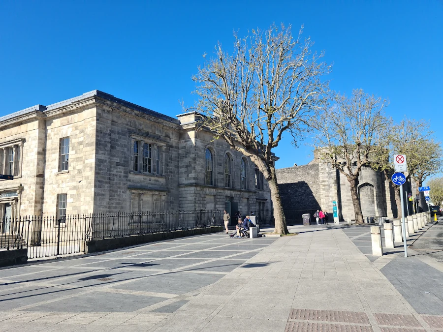 Front view of Kilmainham Gaol in Dublin with blue sky