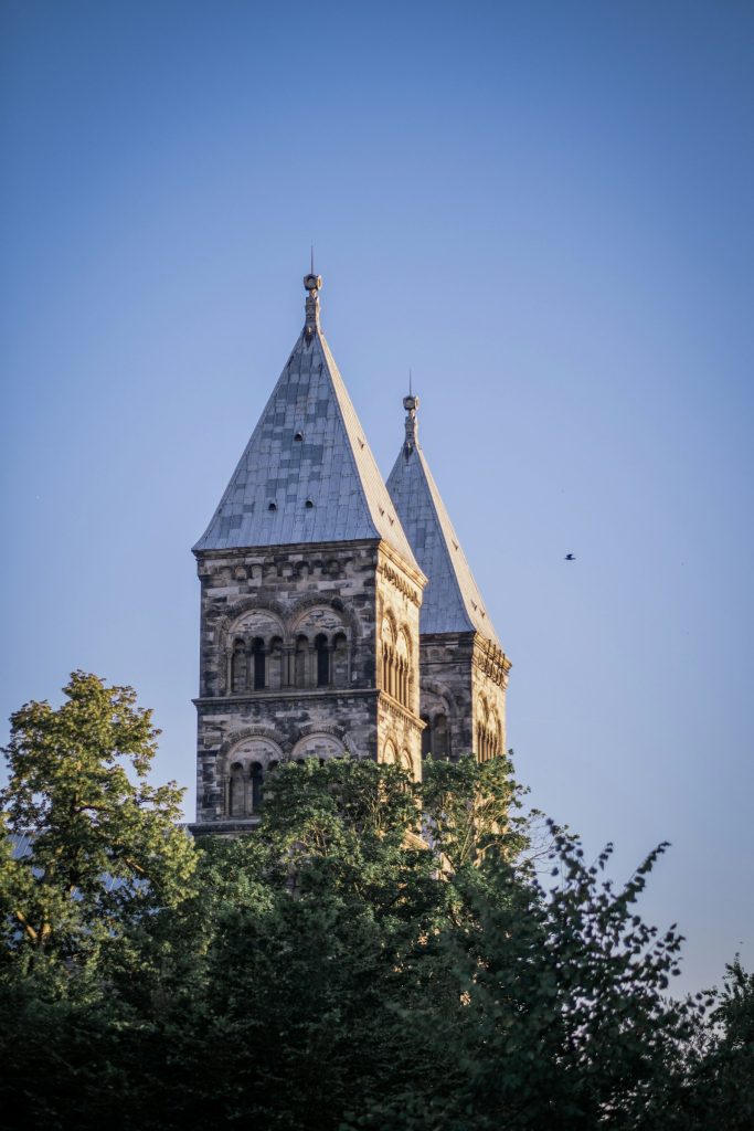 Lund Cathedral in Sweden surrounded by trees