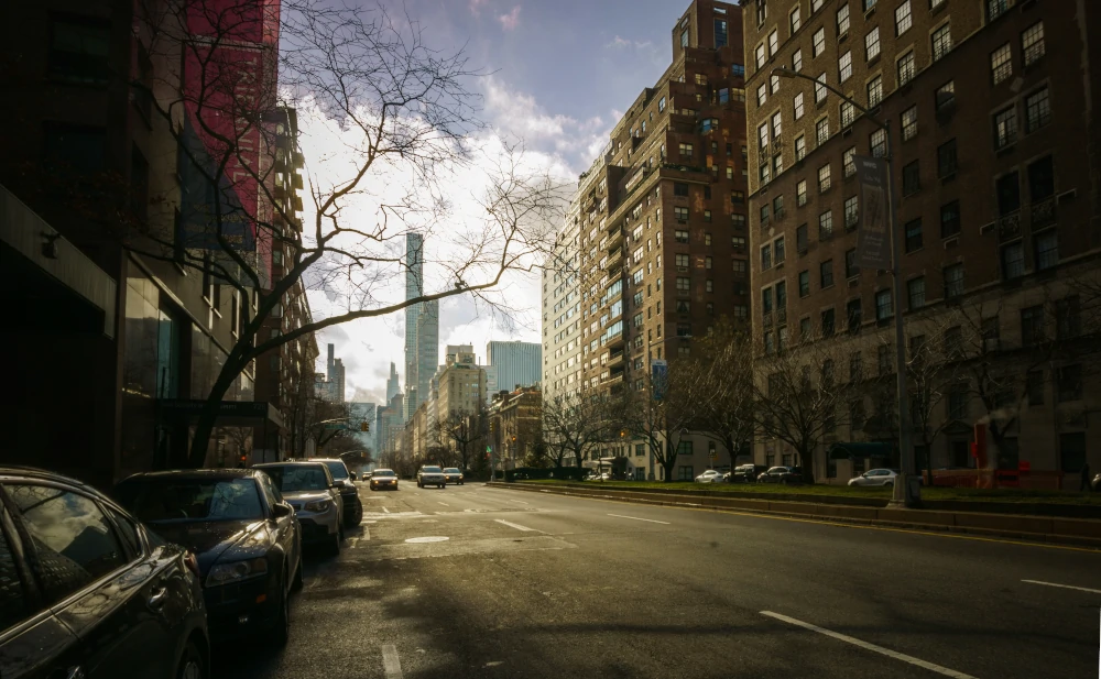 View of Park Avenue at East 70th Street, showcasing the tree-lined median and classic residential architecture of the Upper East Side.