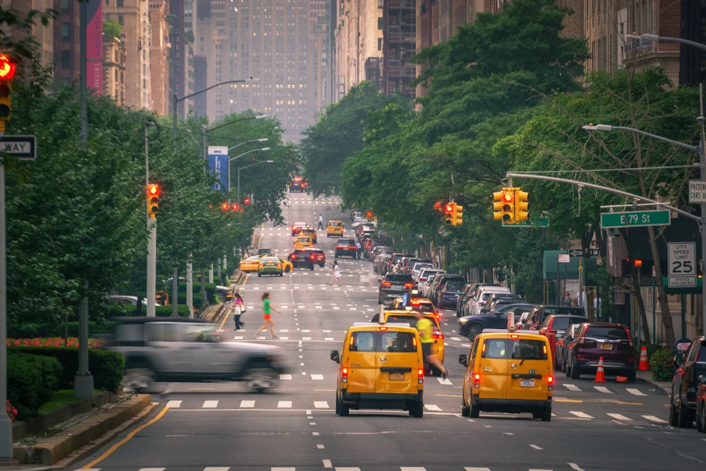 View of Park Avenue at East 79th Street, showcasing the tree-lined median and classic residential architecture of the Upper East Side.